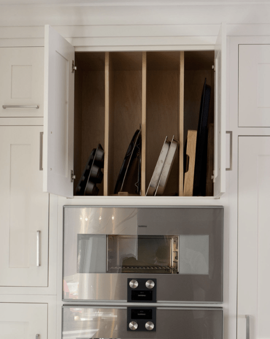 Tray dividers in upper cabinetry