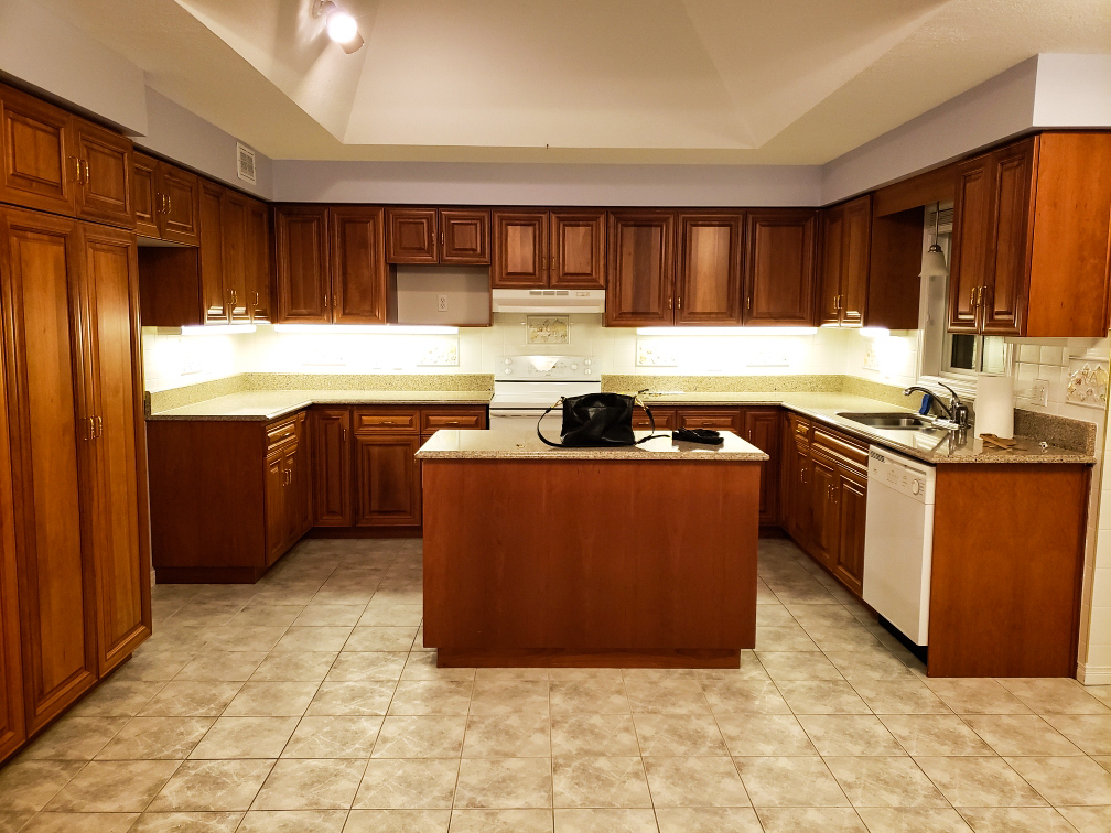 outdated solid wood brown kitchen