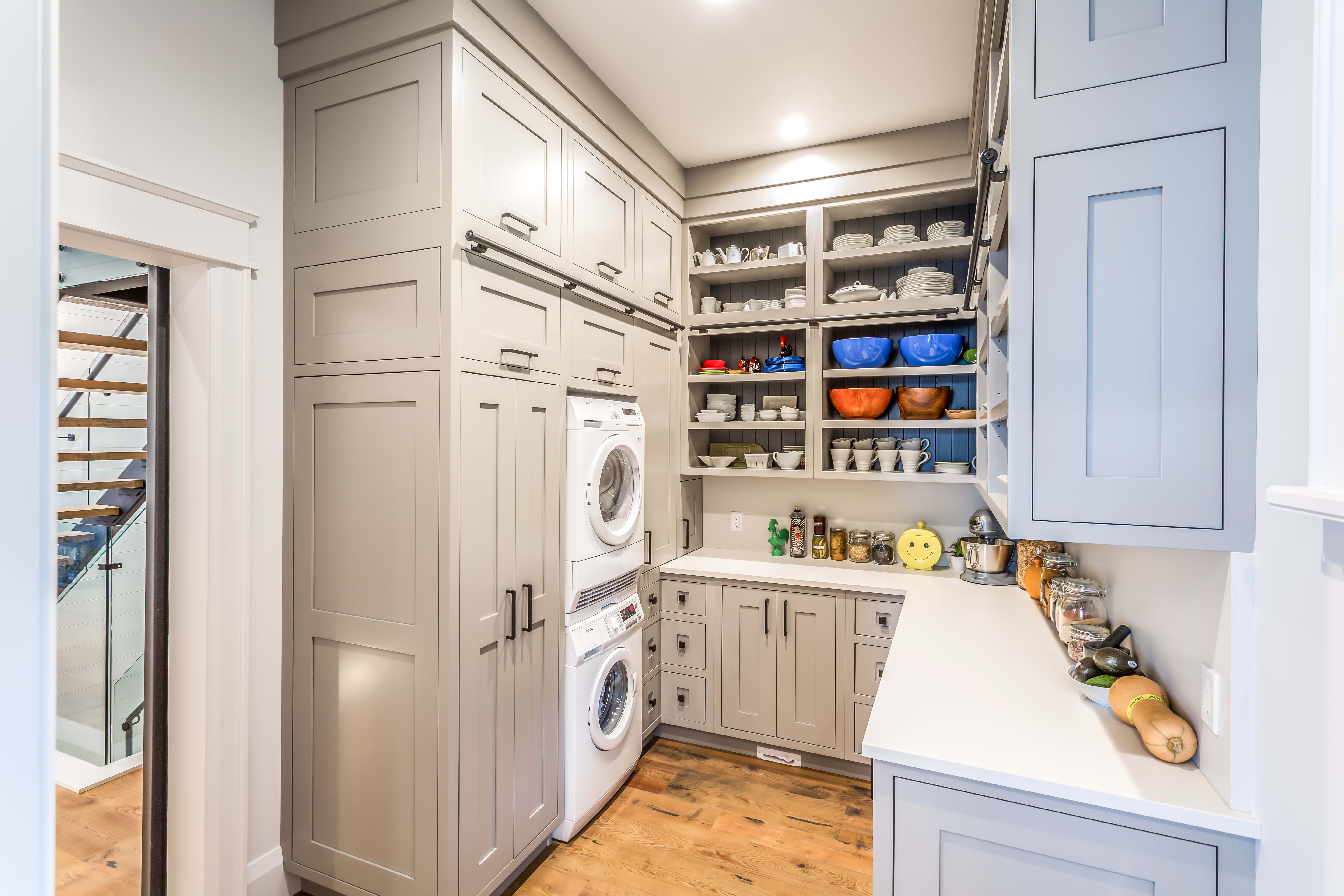 transitional taupe cottage pantry with open shelving and closed cabinets