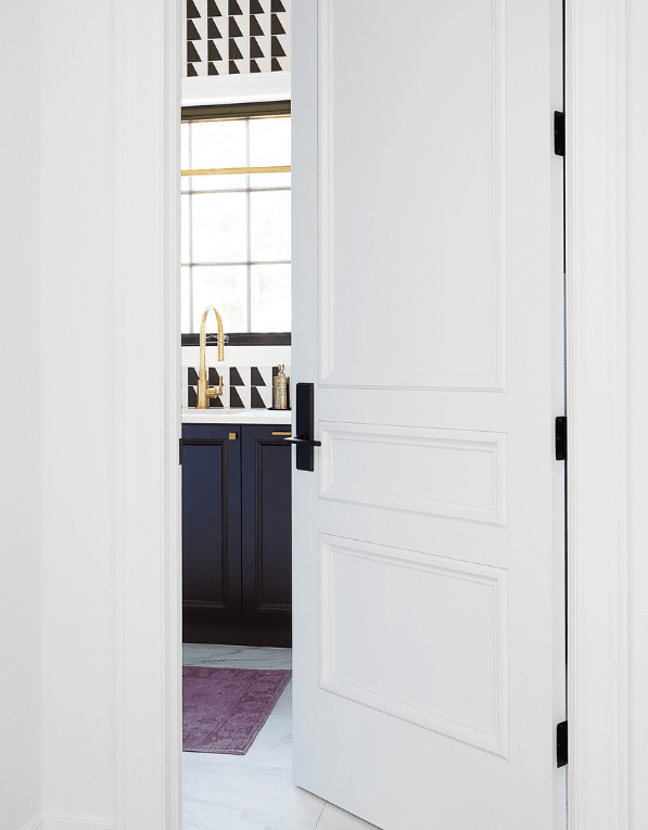 Door to luxury laundry room 