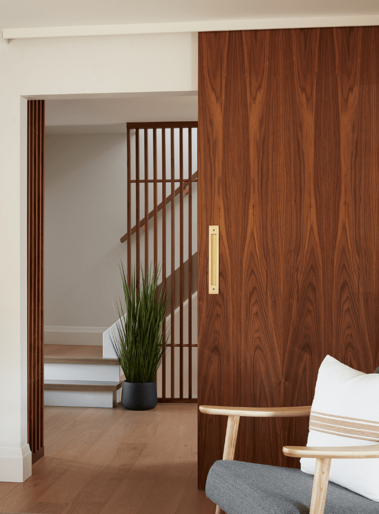 Project Cambria solid walnut sliding door of living room renovation