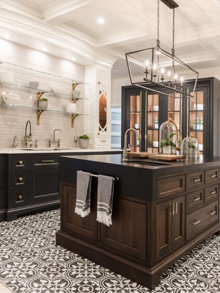 Dark stained wood kitchen cabinets in Waterloo showroom