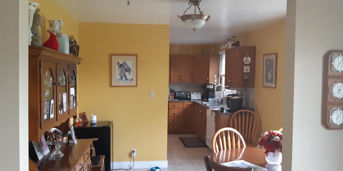 Before picture of the yellow kitchen transformation 