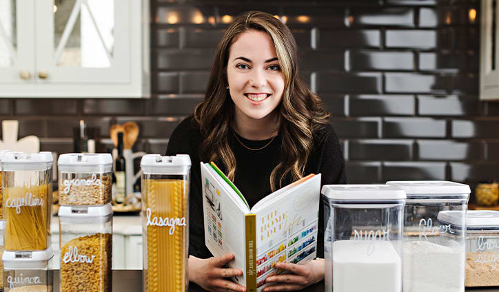 girl organizing kitchen