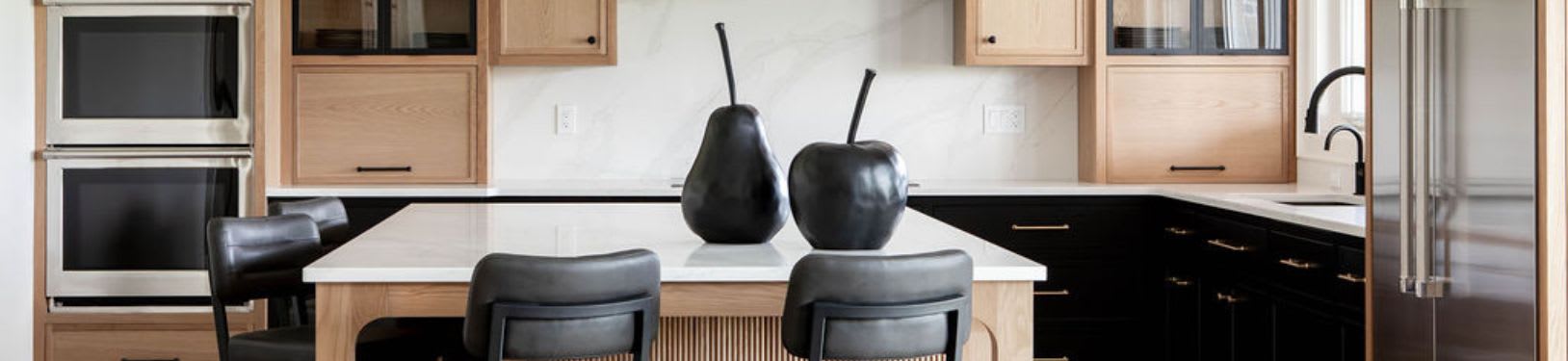 white oak kitchen cabinets with black accents