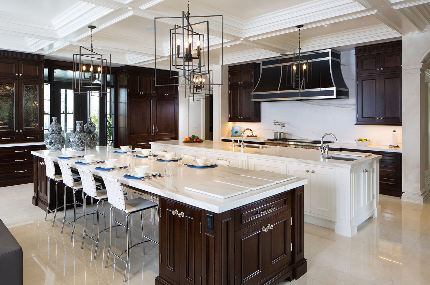 luxury mahogany kitchen with whtie accents and two kitchen islands