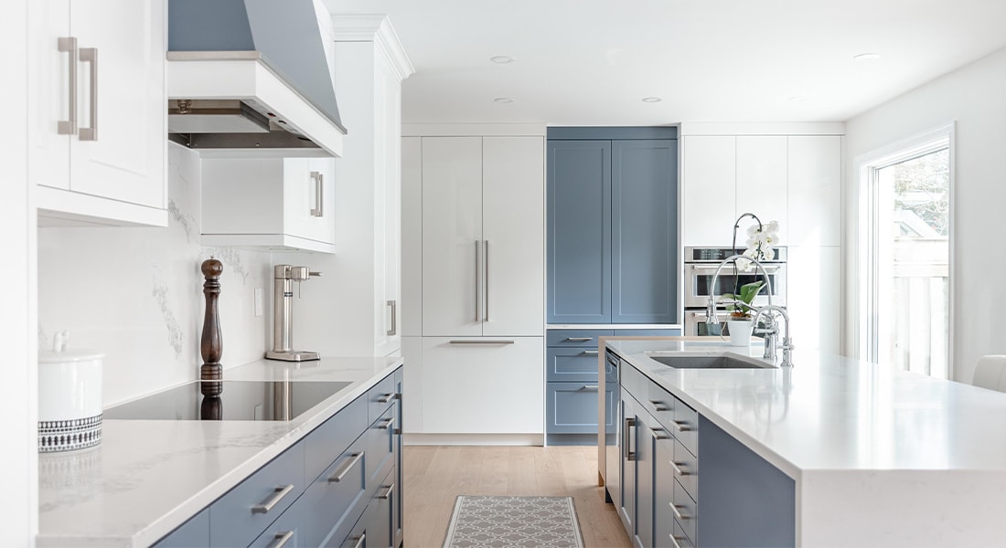white and blue transitional kitchen