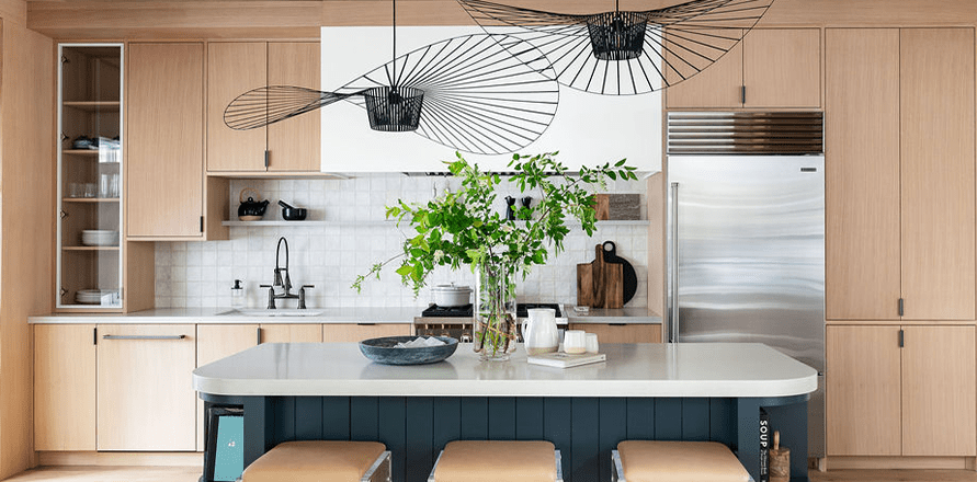 custom cottage kitchen in white oak with navy island